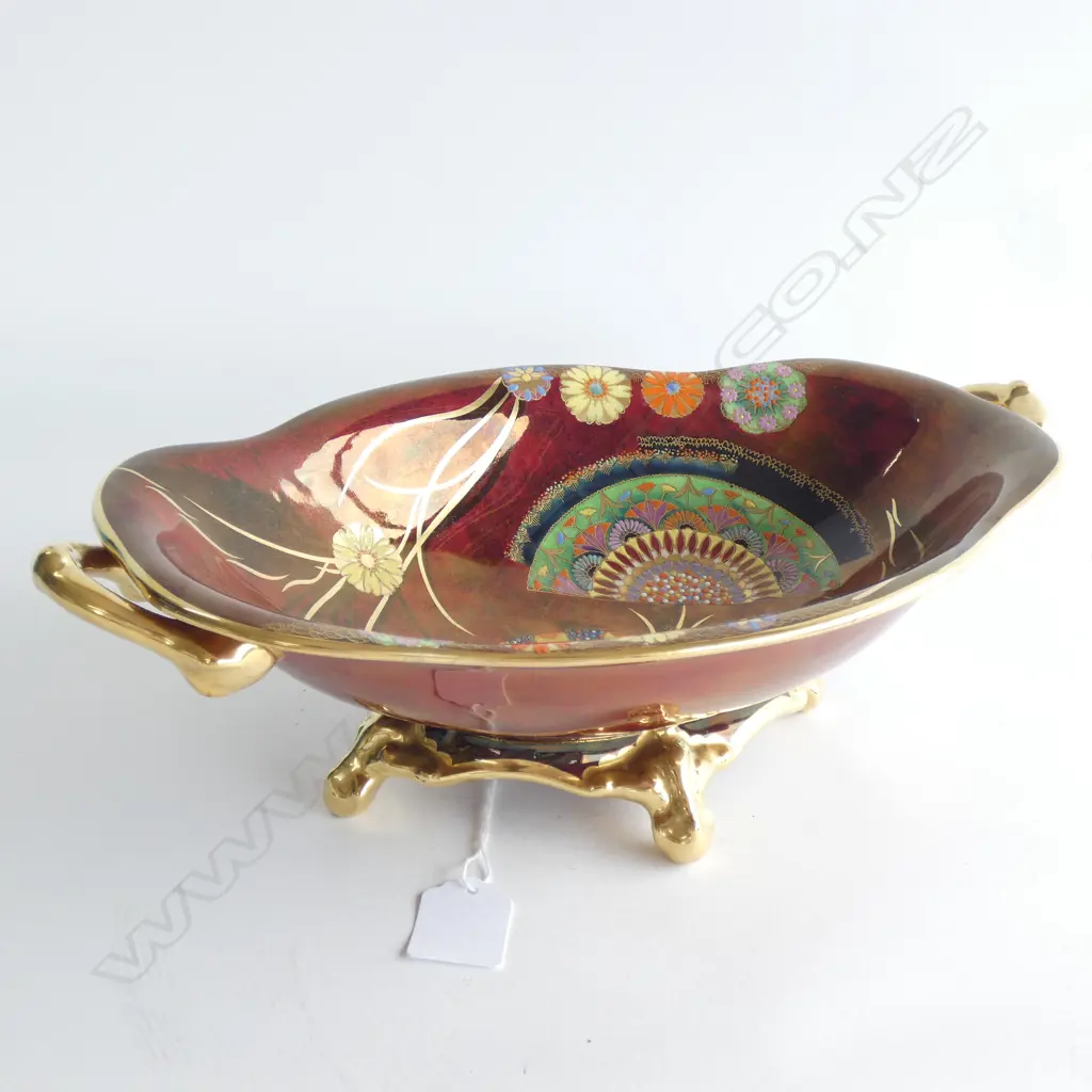 An Art Deco Carlton Ware enamelled bowl on four gilded feet Image 1++