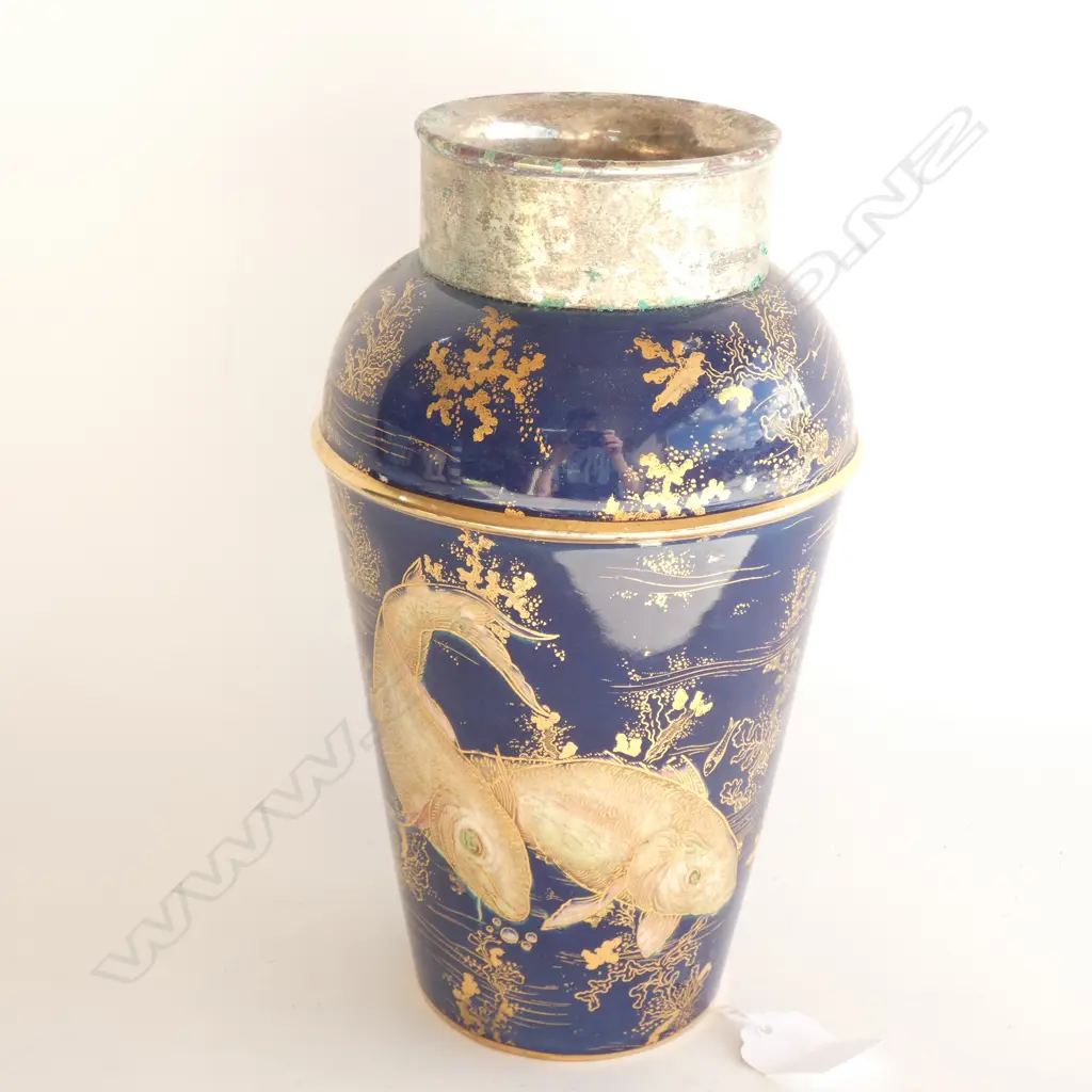 A Carlton ware cocktail shaker with silver plated collar Image 1++