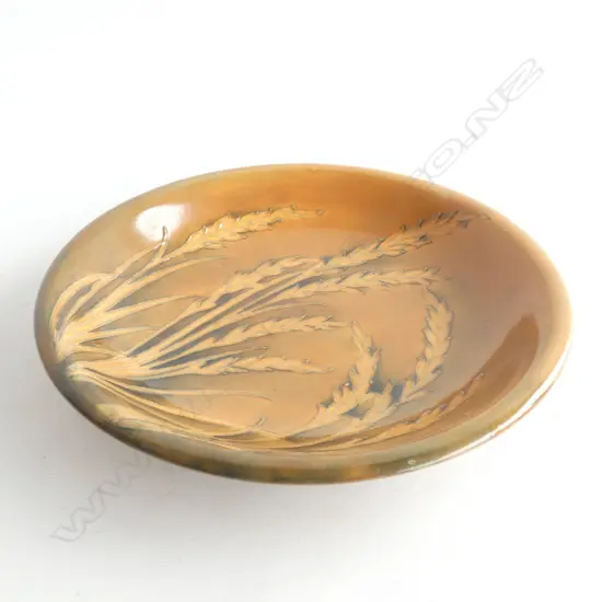 A William Moorcroft waving corn pattern plate. c.1938