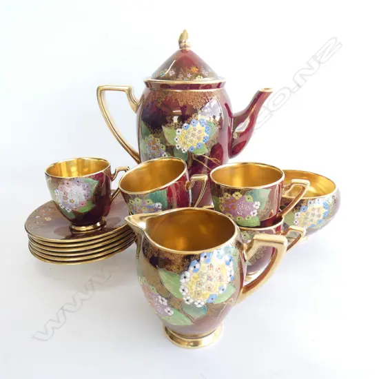 A Carlton ware enamelled part demi-tasse coffee set