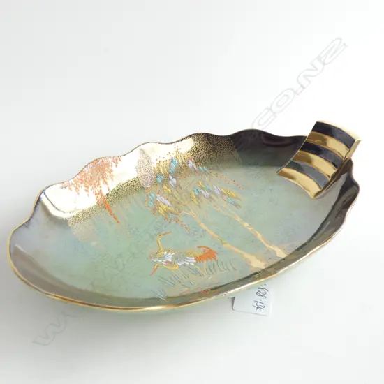 A Carlton ware Verte Royale enamelled dish, 'New Stork' pattern,