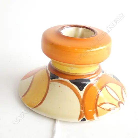 A Clarice Cliff Bizarre "Oranges" pattern candle holder, c.1930s