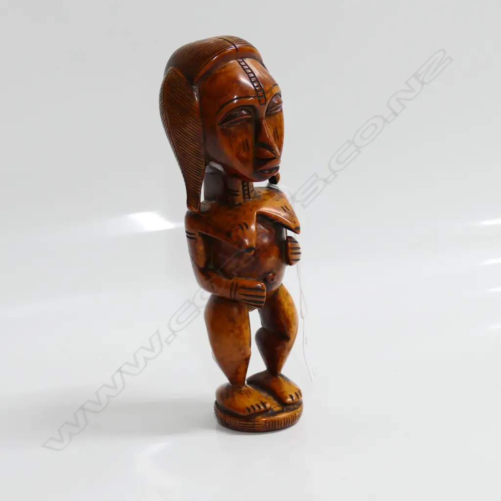 YORUBA BENIN ERE IBEJI SOLID IVORY CARVED FEMALE FIGURE dark staining H.210mm. Image 1++