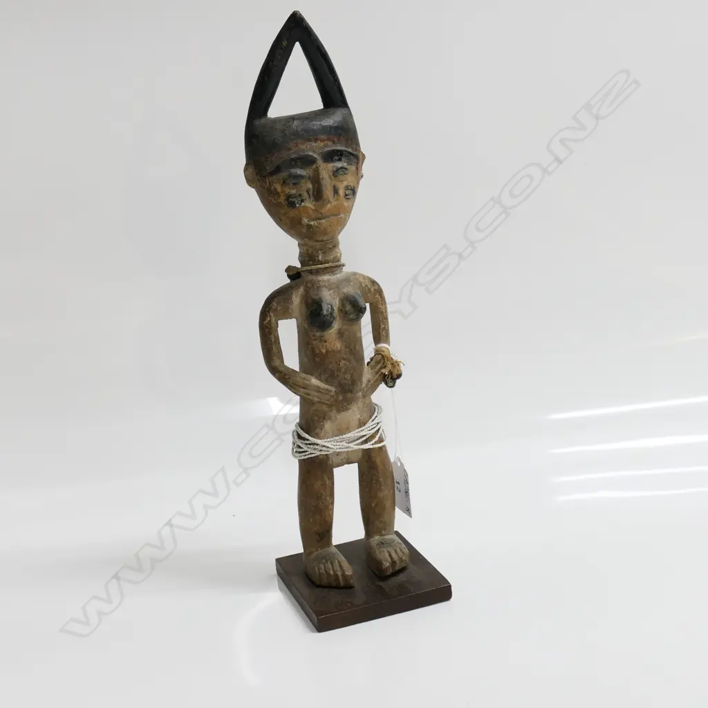 YORUBA BENIN ERE IBEJI WOOD CARVED FEMALE FIGURE with indigo headdress. H.335mm. White fine beads to waist. Image 1++