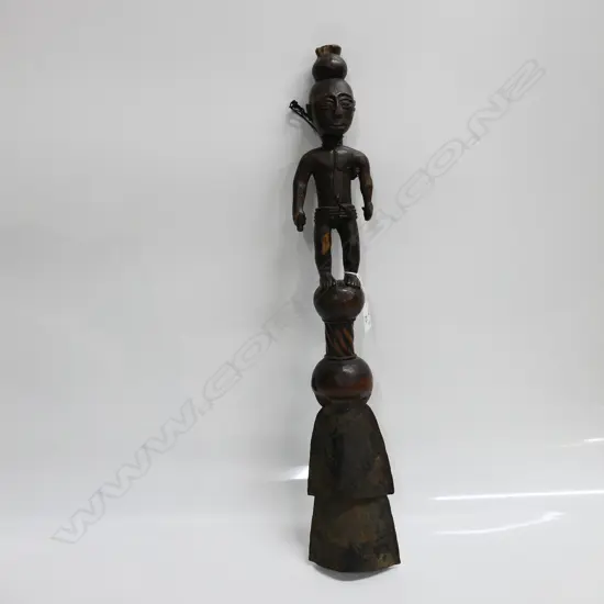 AFRICAN GHANA DBLE BELL with male figured carved wood handle showing wear. Iron bells w no clapper L.540mm