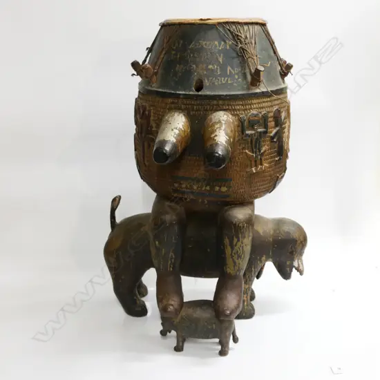 AFRICAN ASHANTI CARVED WOOD DRUM WITH MAN ON PIG, H.740mm.