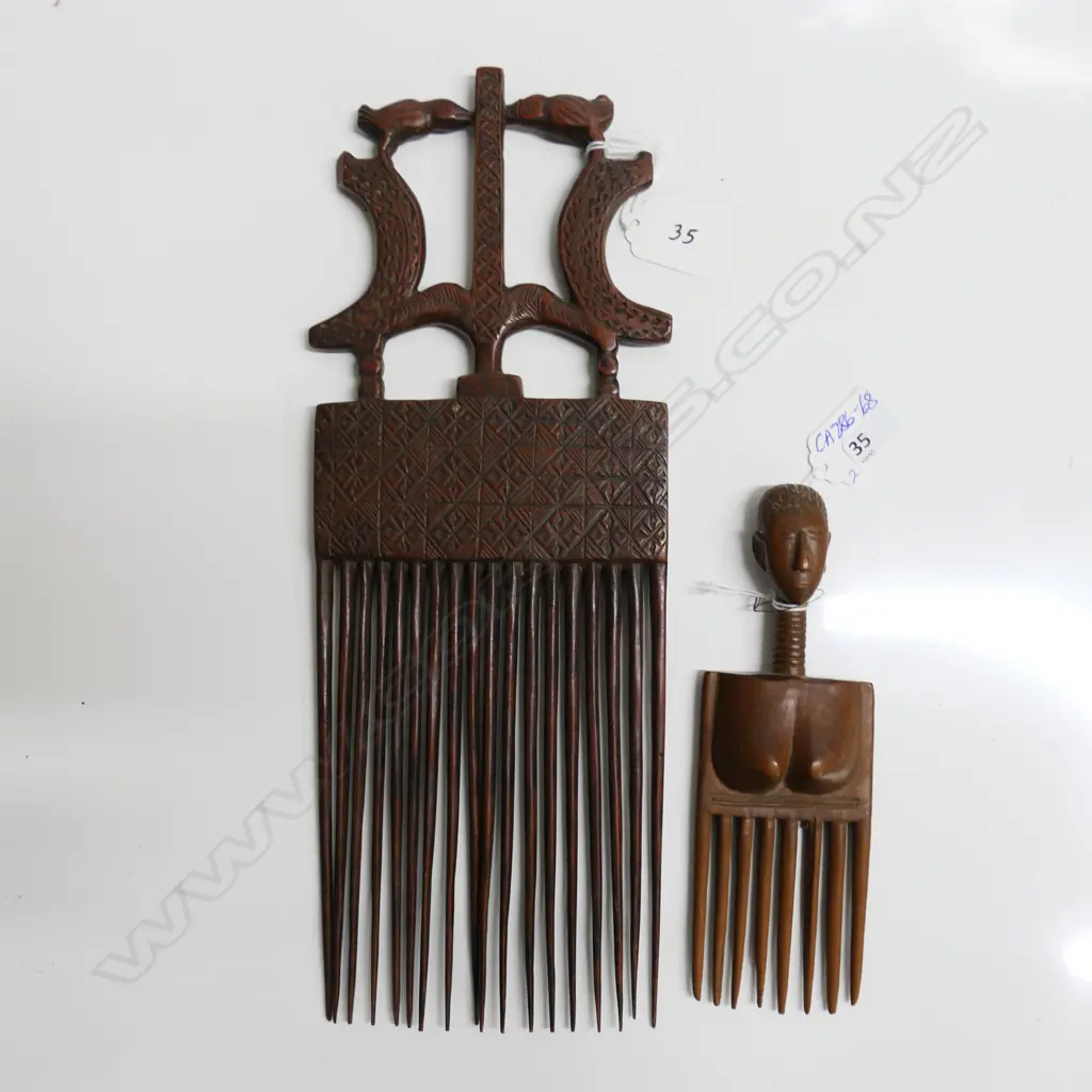 2 AFRICAN ASHANTI GHANA CARVED WOOD COMBS:1 of stylised female fertility form (L.260mm ) the other larger Image 1++