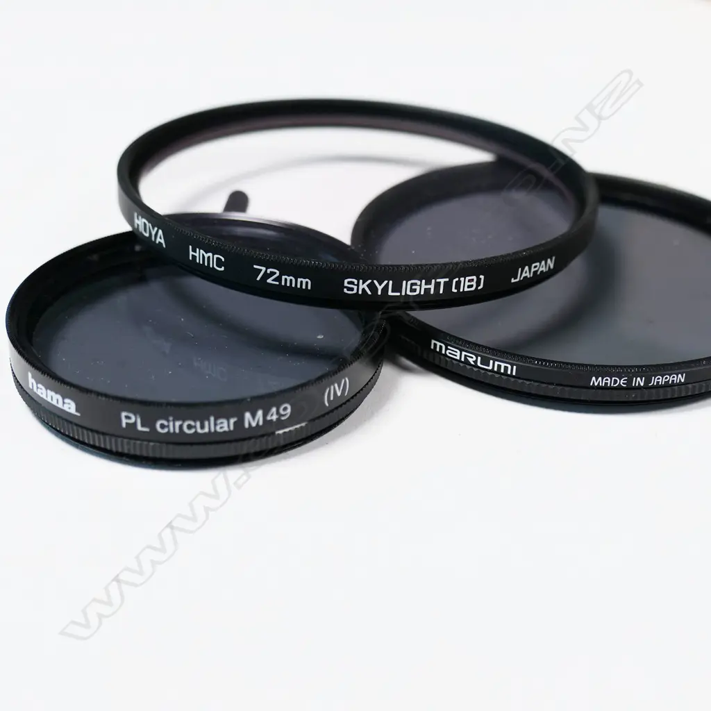 COLLECTION: LENS, LEICA BOOK, PINS, SMALL EQUIPMENT & OTHER PHOTOGRAPHIC ITEMS, additional photos added of lens Image 1++