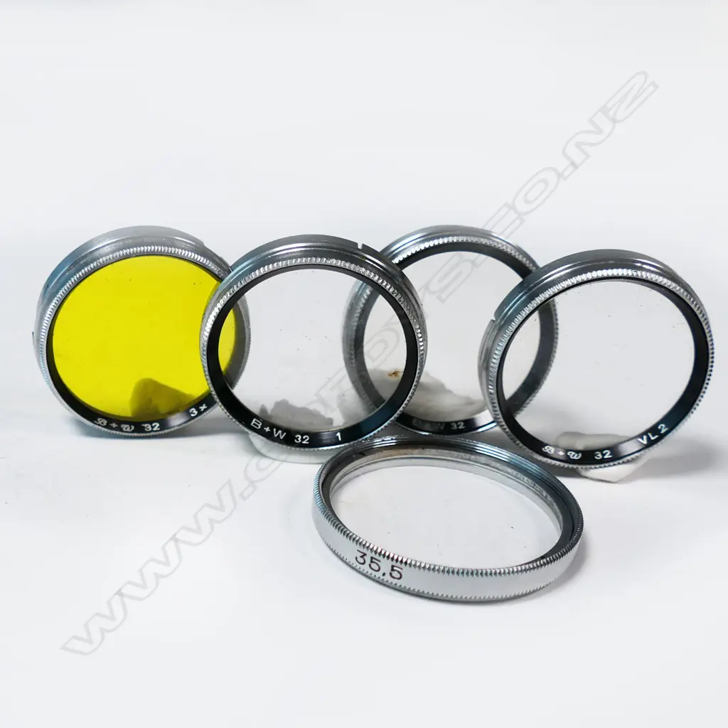 COLLECTION: LENS, LEICA BOOK, PINS, SMALL EQUIPMENT & OTHER PHOTOGRAPHIC ITEMS, additional photos added of lens Image 1++