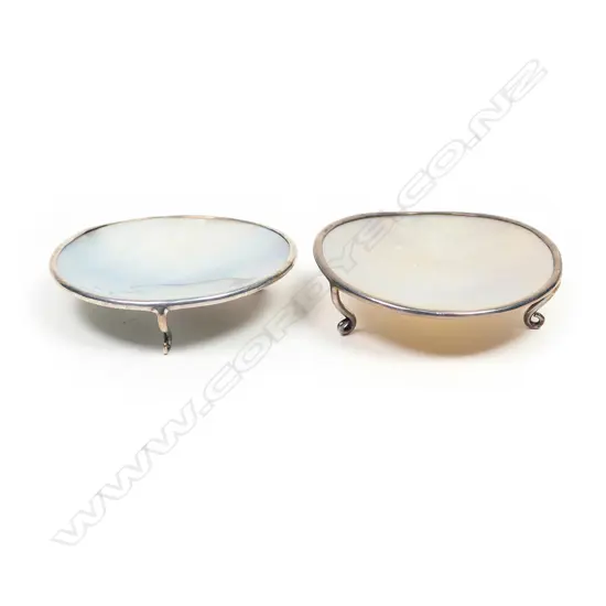 A pair of silver and mother-of-pearl shell salts,