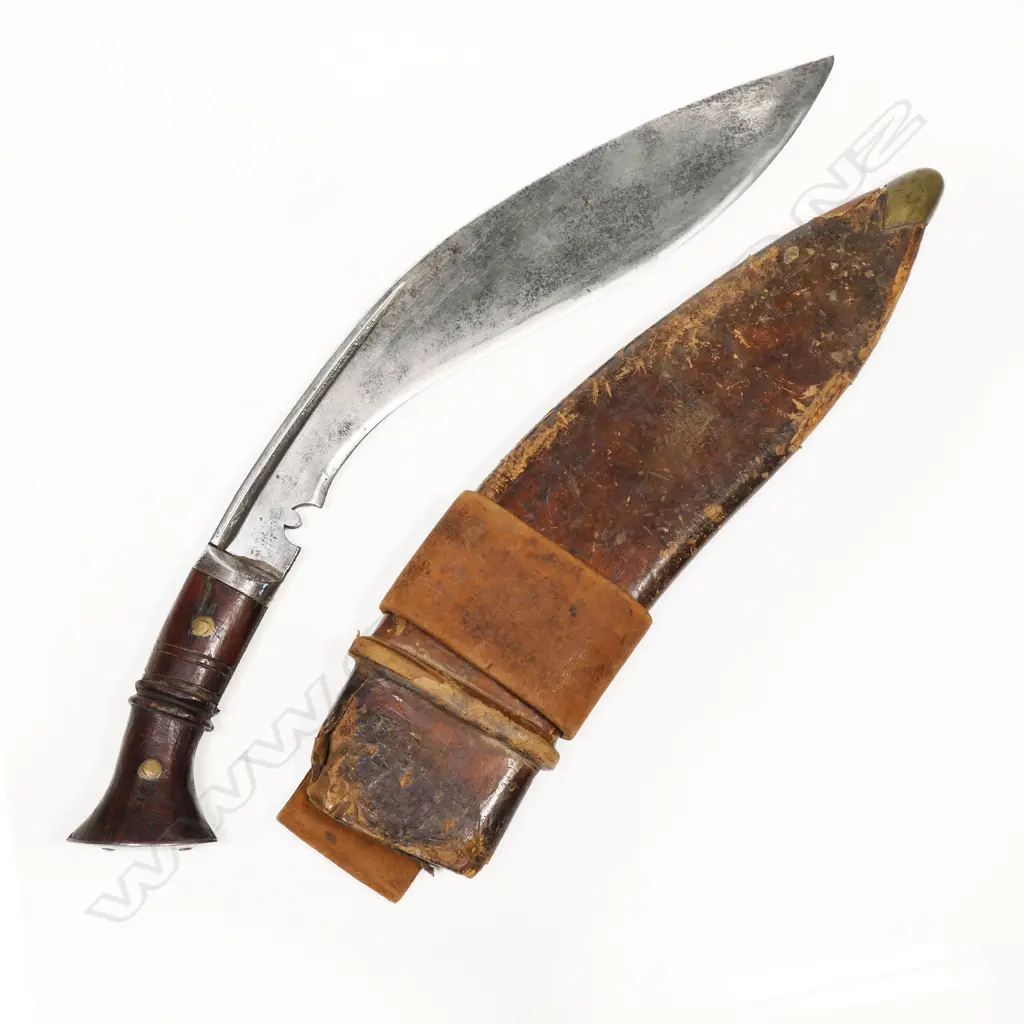 1916 dated Gurkha kukri in leather scabbard. Some markings and wear to the top. L.450mm Image 1++