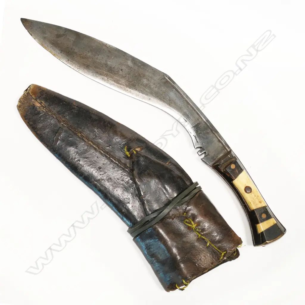 Gurkha kukri. An old item in leather scabbard. Bone handle possibly not a military used item but of some age. L.420mm. NOTE: INCORRECT PHOTO ORIGINALLY SHOWN. THIS IS THE CORRECT PHOTO Image 1++