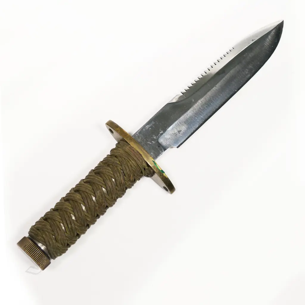 Randall model 18 with cord wrapped handle. No scabbard however has contents in handle tube. L.310mm Image 1++