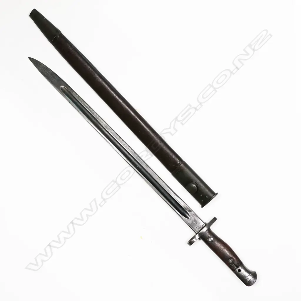 1907 bayonet dated 1940 with leather scabbard this seems to be dated 1944. L.550mm Image 1++