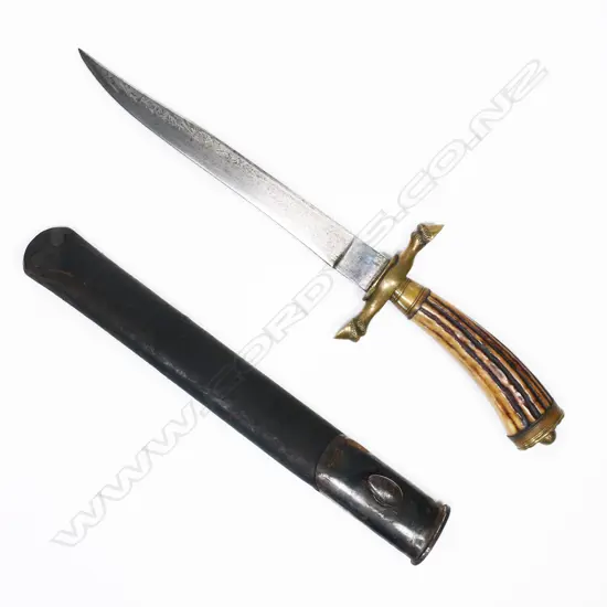 Possibly German hunting knife with horn handle. Incorrect scabbard but it fits. L.340mm