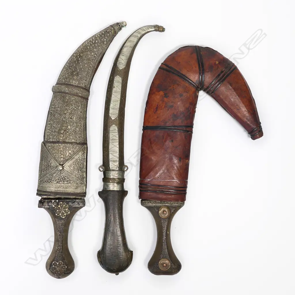 Three Middle Eastern knives with scabbards. Lgst.360mm Image 1++