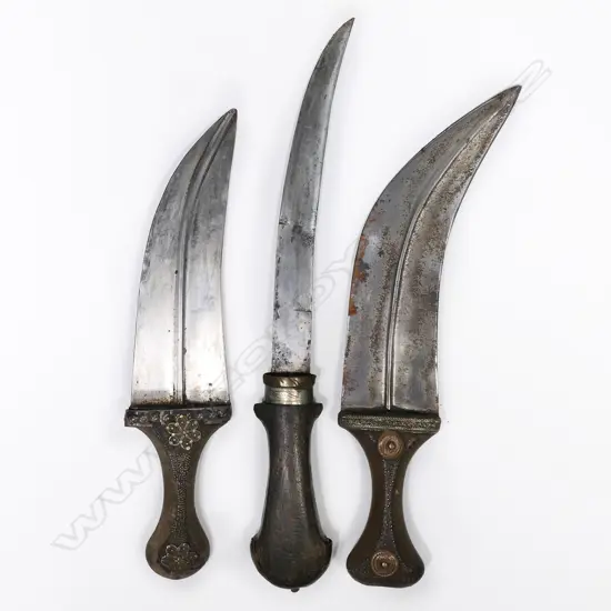 Three Middle Eastern knives with scabbards. Lgst.360mm