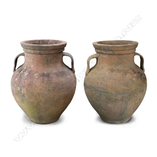 A pair of large terracotta 'amphora' urns