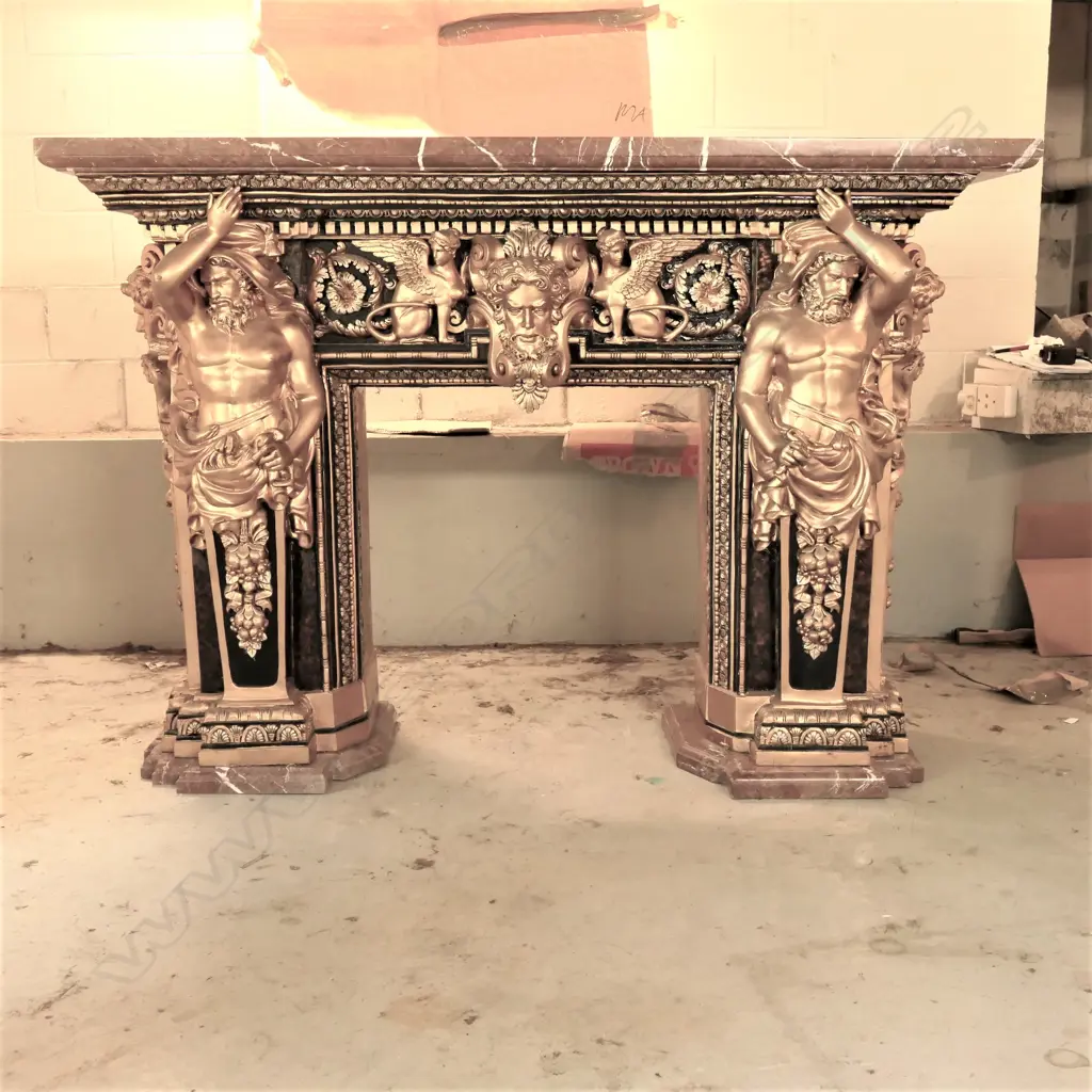 A Baroque style polychrome decorated cast bronze marble top fire surround Image 1++
