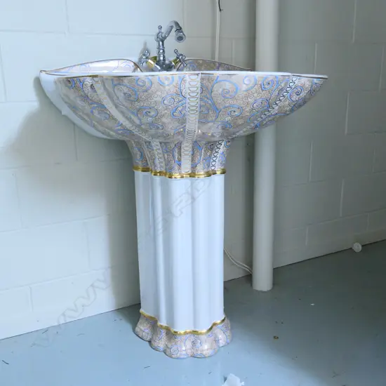 An ornate European porcelain sink named Geissegi