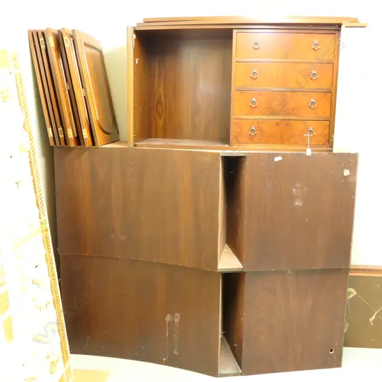 A large multi-section Queen Anne style walnut chest unit