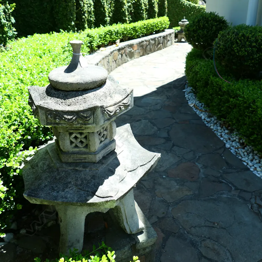 A pair of concrete Chinese temple form outdoor sculptures Image 1++