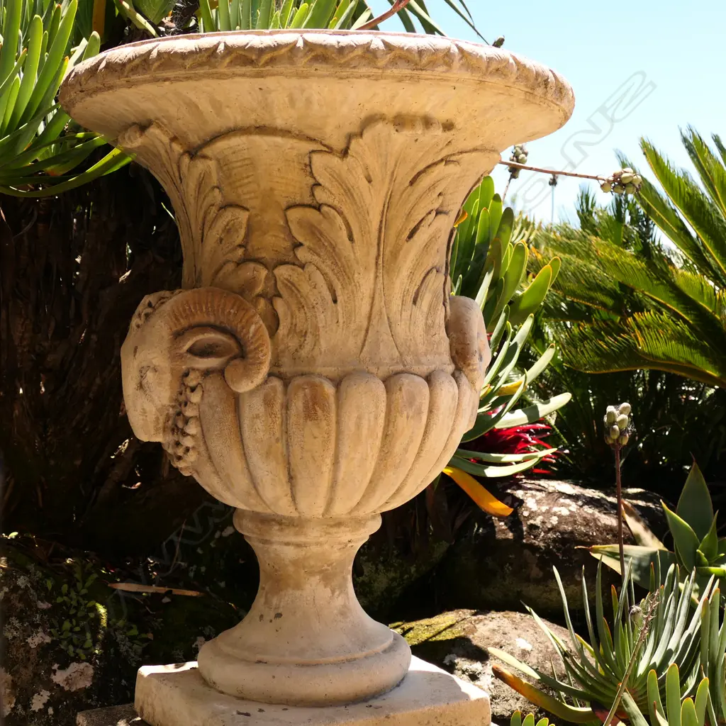 A pair tall concrete classical garden urns on plinth bases Image 1++