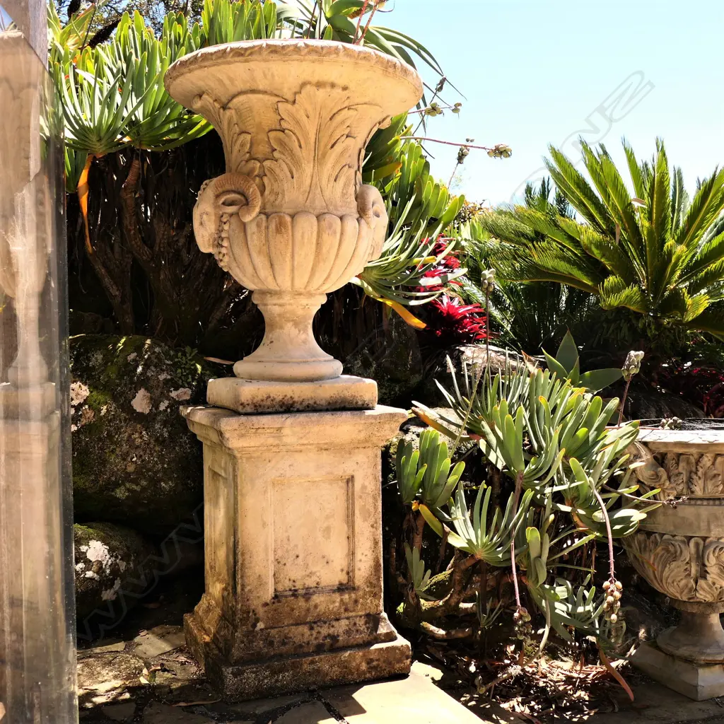 A pair tall concrete classical garden urns on plinth bases Image 1++