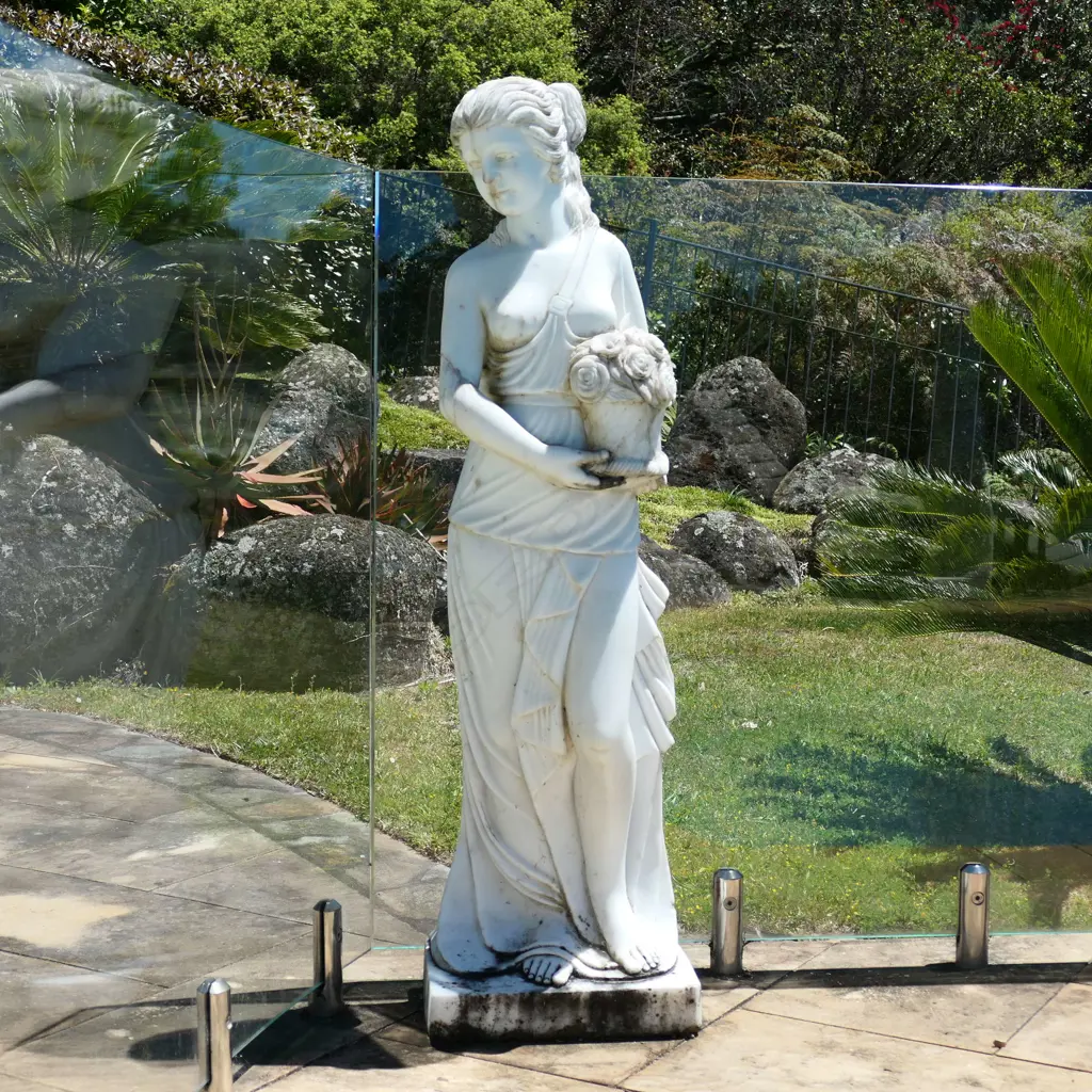 A tall carved marble goddess statue Image 1++