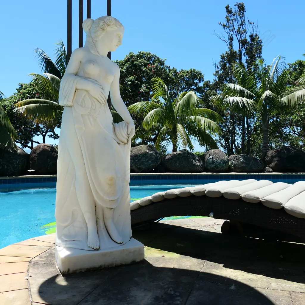 A tall carved marble woman statue Image 1++