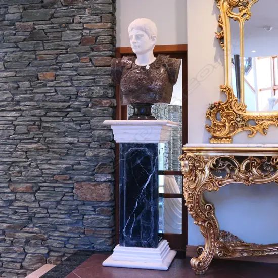 A large Roman carved marble bust of Augustus Caesar