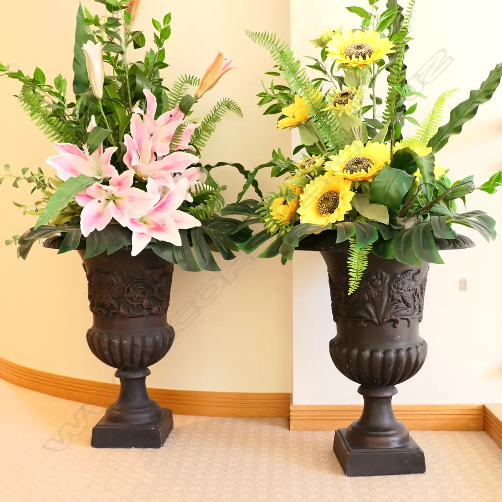 A pair of plastic black classical garden urns Image 1++