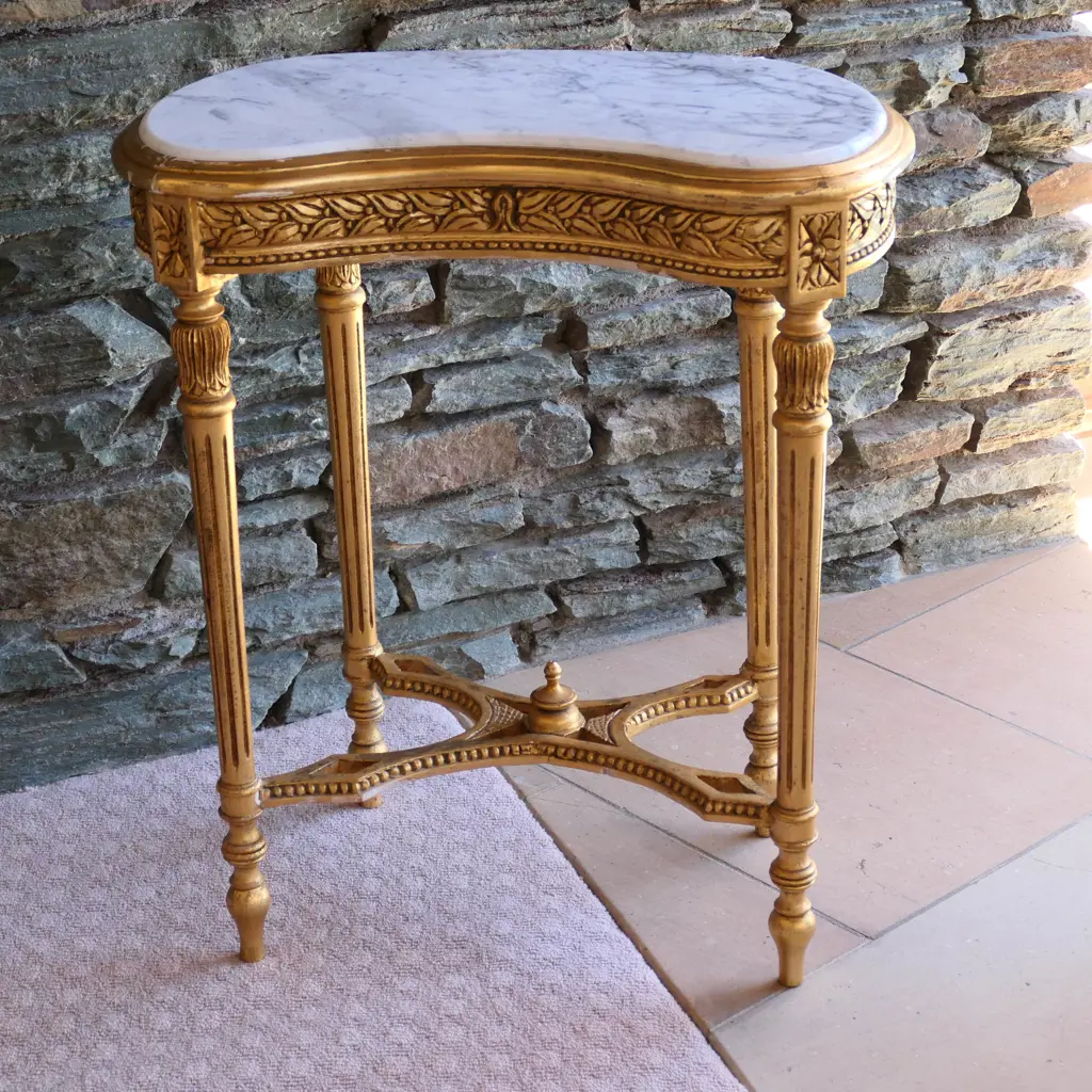 A marble topped gilt kidney form table Image 1++