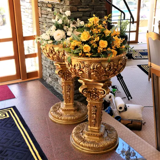 A pair large gilt plastic pedestal planters