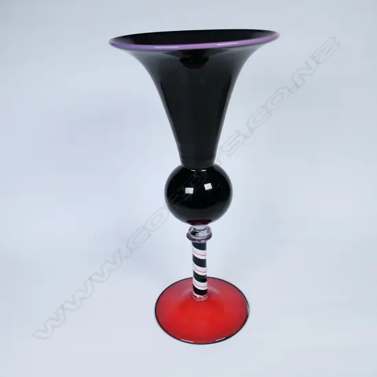 An art glass pedestal trumpet vase,