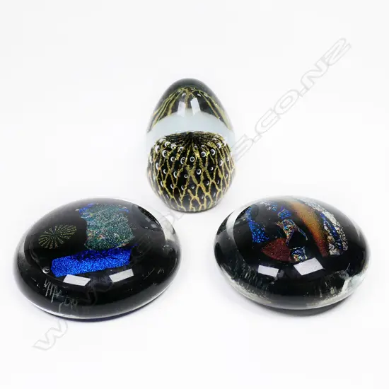 Three art glass paper weights,