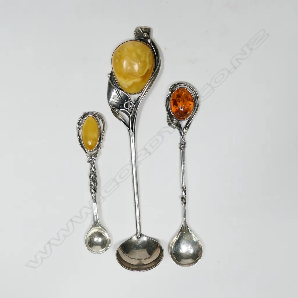 Three art silver and amber small serving spoons, Image 1++