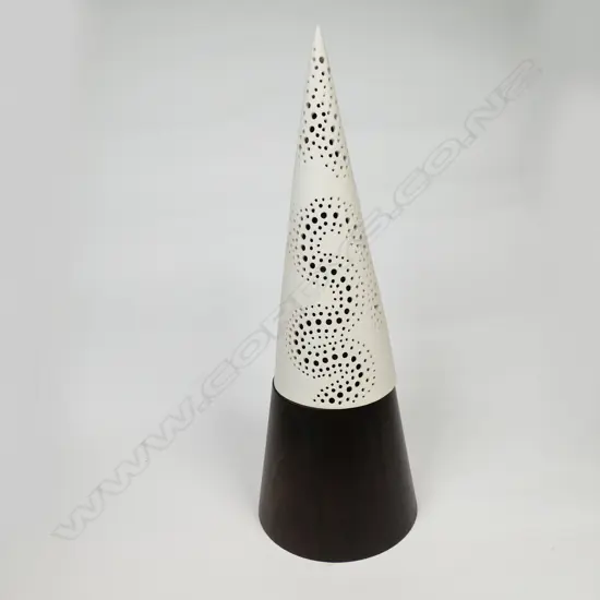 A Trudi Kroef Studio art porcelain cone on hardwood,