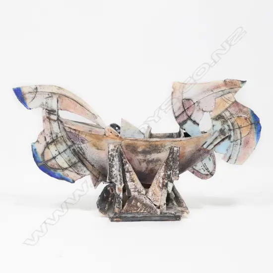 Penny Ericson sculptured stylised boat in cradle,