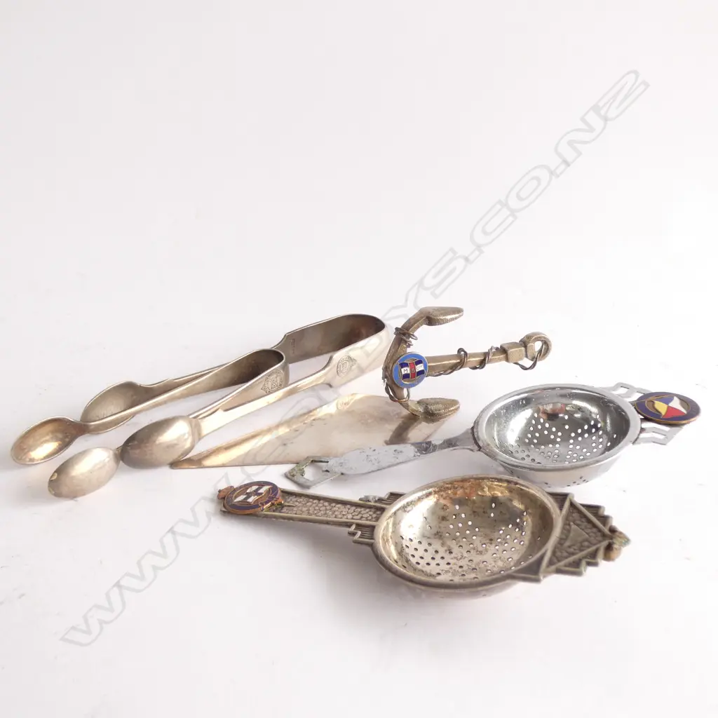 SHIPPING ITEMS; 2 TEA STRAINERS / 2 PR SUGAR TONGS / CAKE SLICE WITH ANCHOR HANDLE  Image 1++