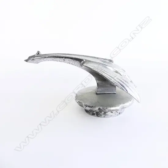 Chrome bird car mascot,