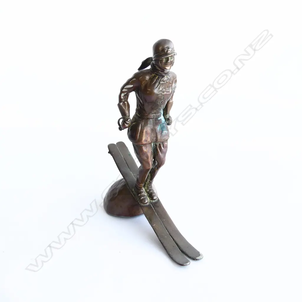 Riley copper/bronze Art Deco female skier (no poles) car mascot, Image 1++