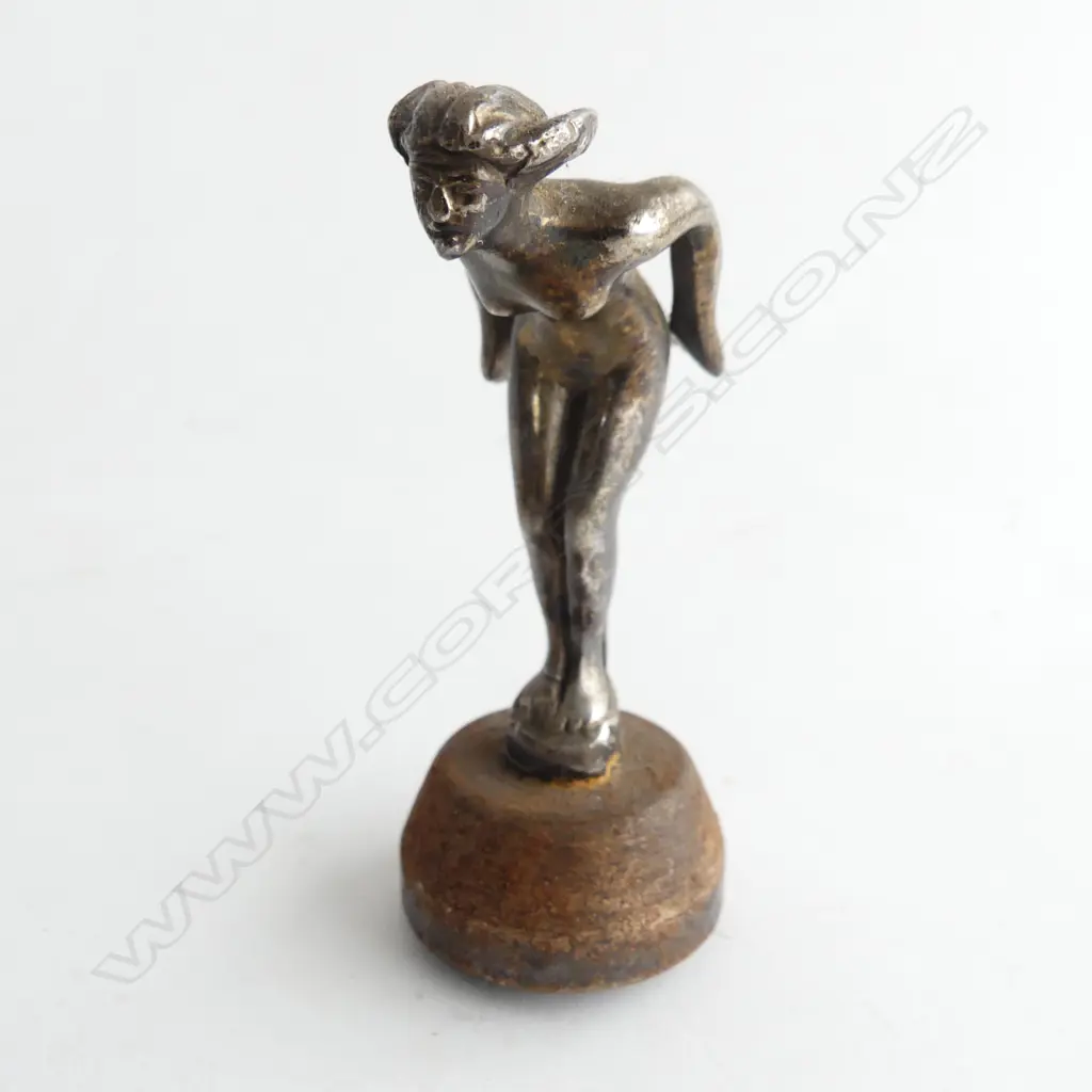 Small chrome poised lady motorcycle (or light car) mascot, Image 1++