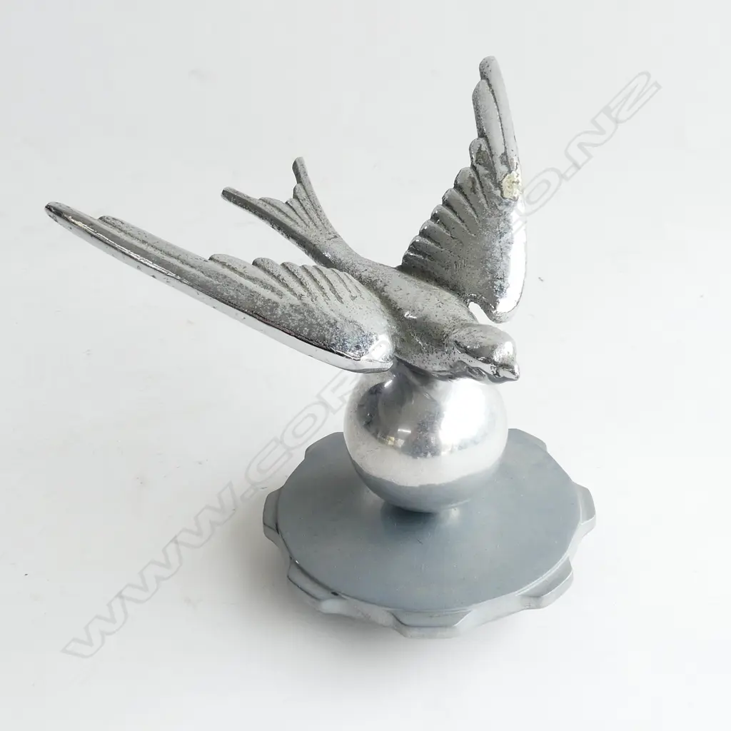 Chrome swallow bird on a ball car mascot, Image 1++