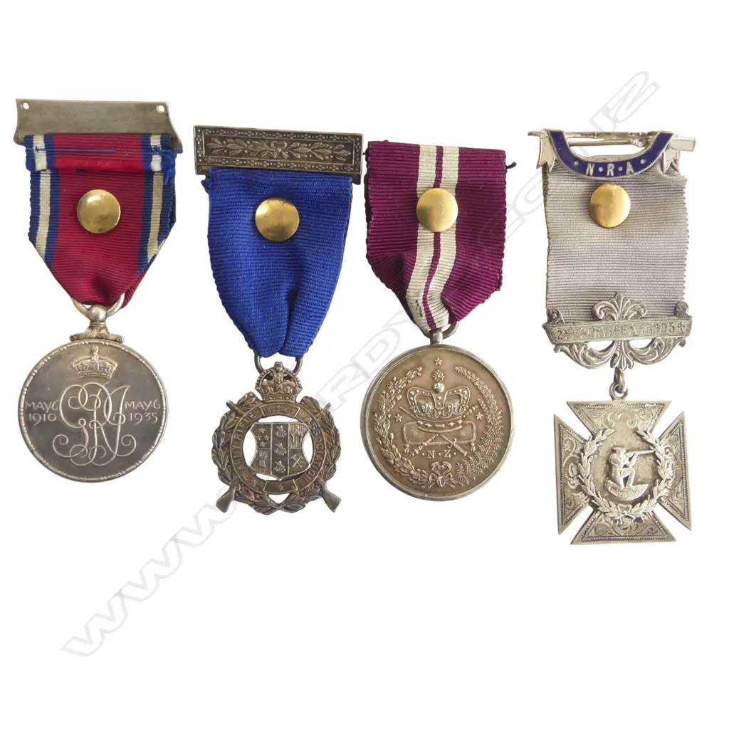 Two NZ silver shooting medals along with Jubilee and Long Service Medals to a bank worker who faced attempted murder and was wounded as the victim of a botched highway robbery attempt; before serving and surviving the Western Front, Image 1++