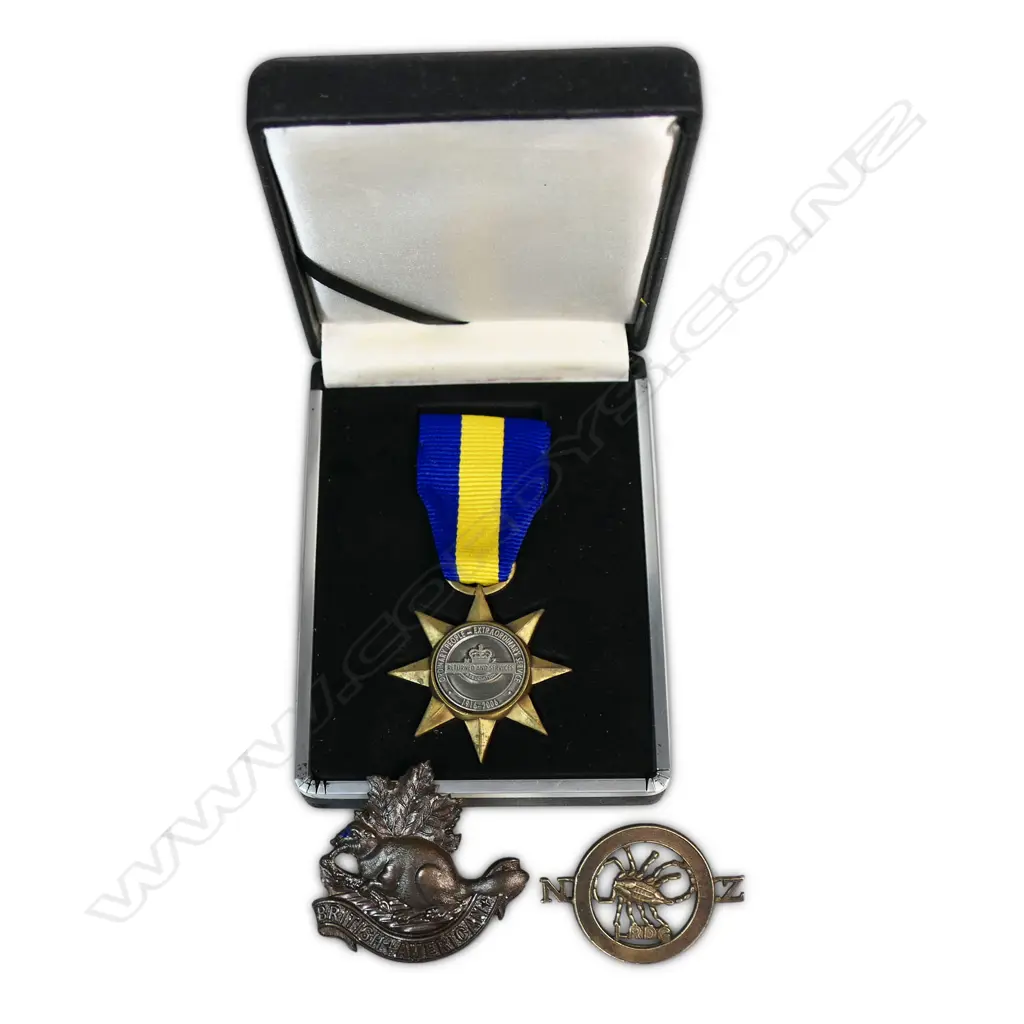 NZ Long Range Desert Group badge (possibly a reunion badge) and an embroidered L.R.D.G New Zealand embroidered title along with an RSA 90th anniversary medal in box and a British-American Squadron of the King's Colonials cap badge.. Image 1++