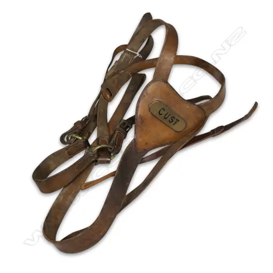 An early 20th century NZ military set of leather field suspenders with 'Cust' embellishment,