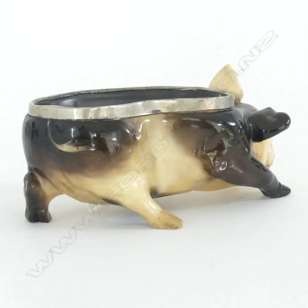 DOULTON FIGURAL BOWL IN THE FORM OF A PIG WITH STERLING SILVER RIM. LONDON 1914. L.175mm Image 1++