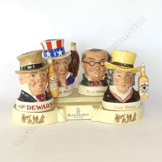 4 DOULTON CHARACTER WHISKY DECANTERS ON DISPLAY STAND 
