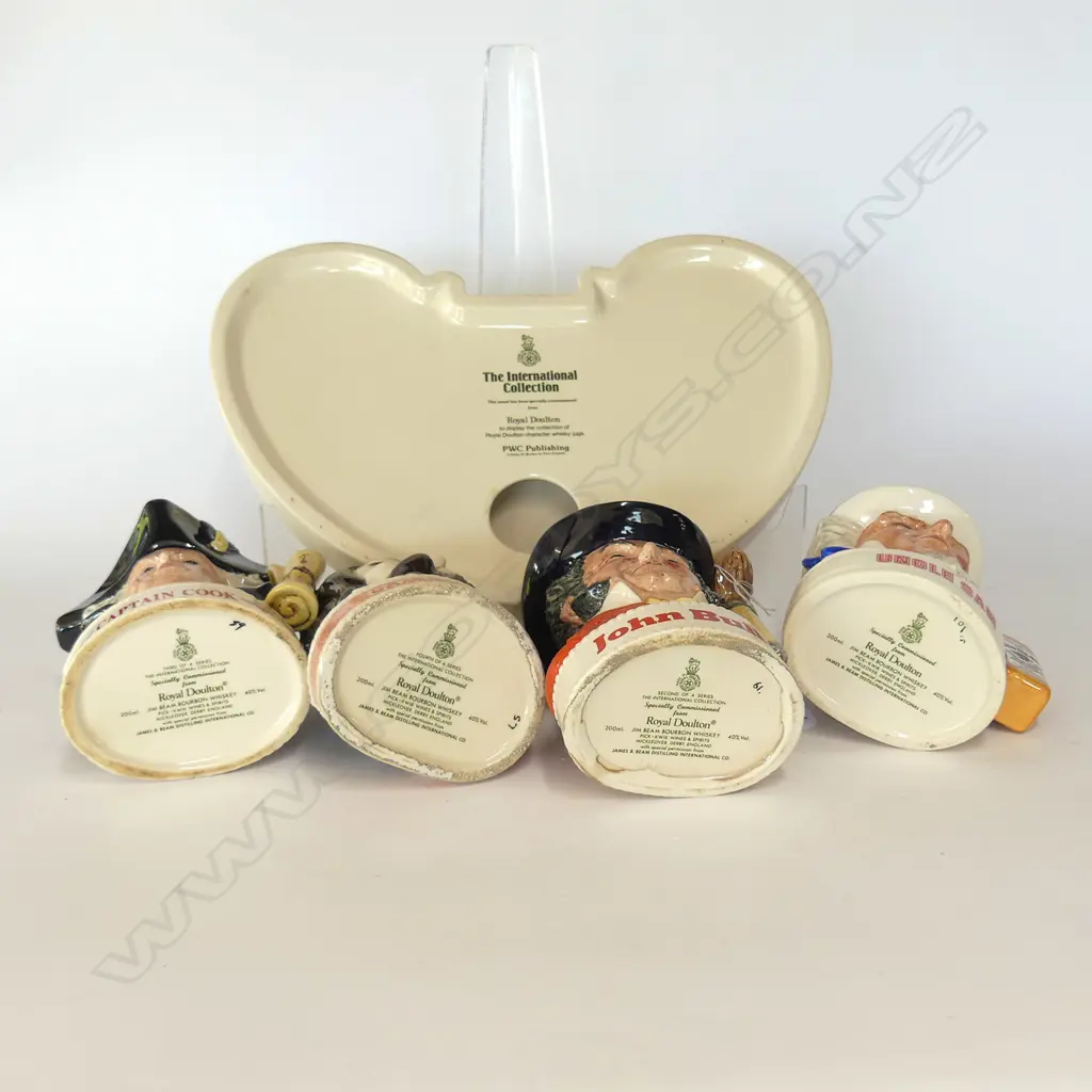 4 DOULTON JIM BEAM CHARACTER WHISKY DECANTERS ON DISPLAY STAND  Image 1++